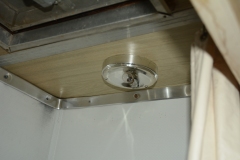 Light fixture missing cover.
