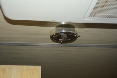 Light fixture missing cover.